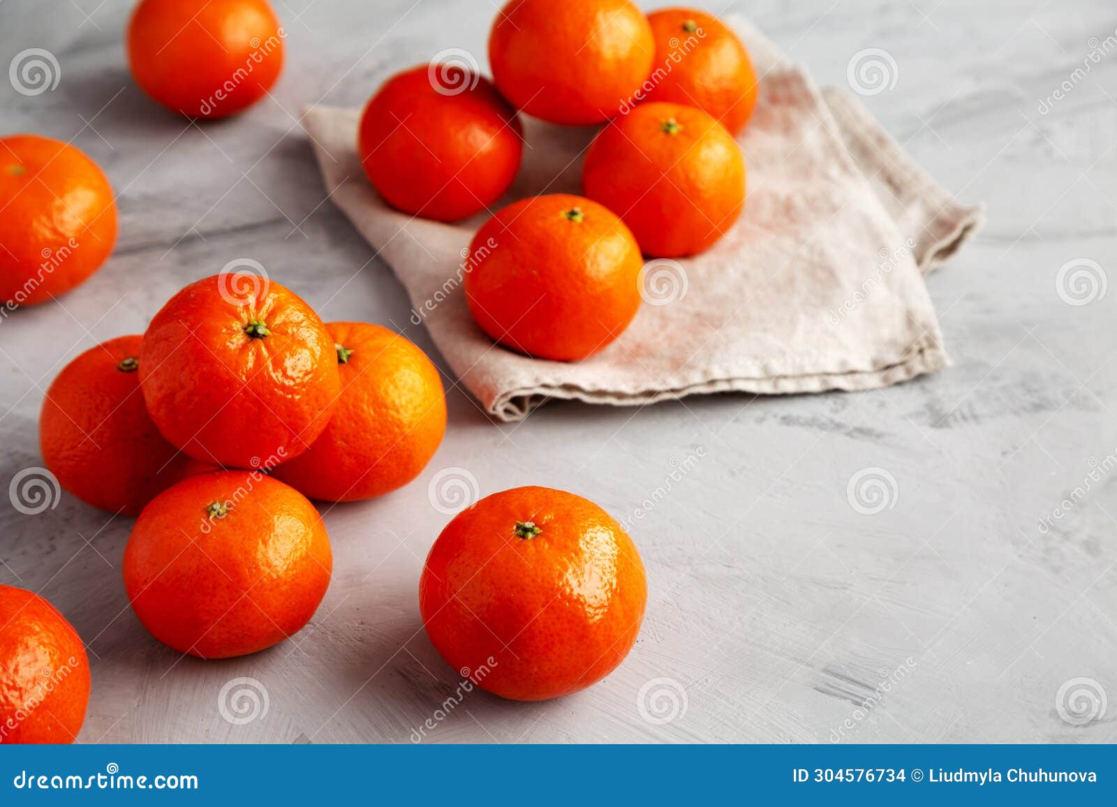 Organic Raw Mandarin Oranges on a Gray Background, Side View Stock ...