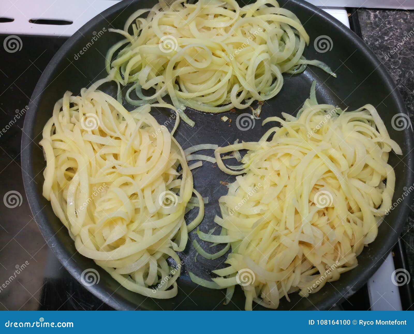 Organic Spiralized Potatoes Frying Stock Photo Image Of Organic Potatoes 108164100