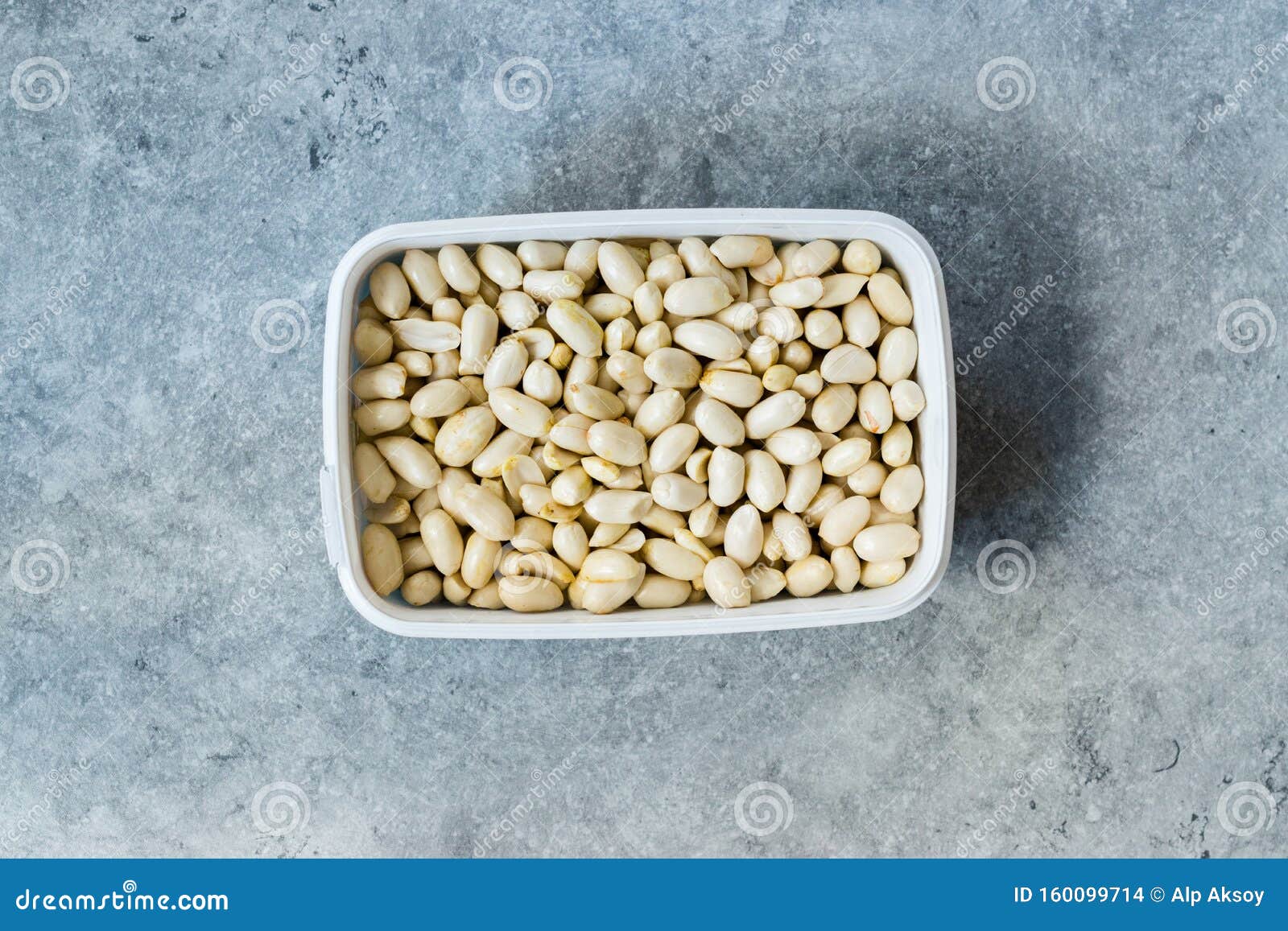 Organic Unsalted Peanuts In Heart Symbol Isolated On White Background