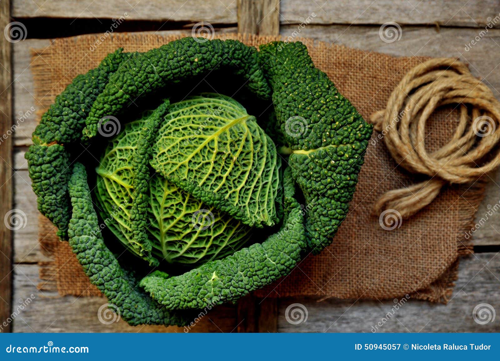 organic vegetables : green cabbage on a wooden board