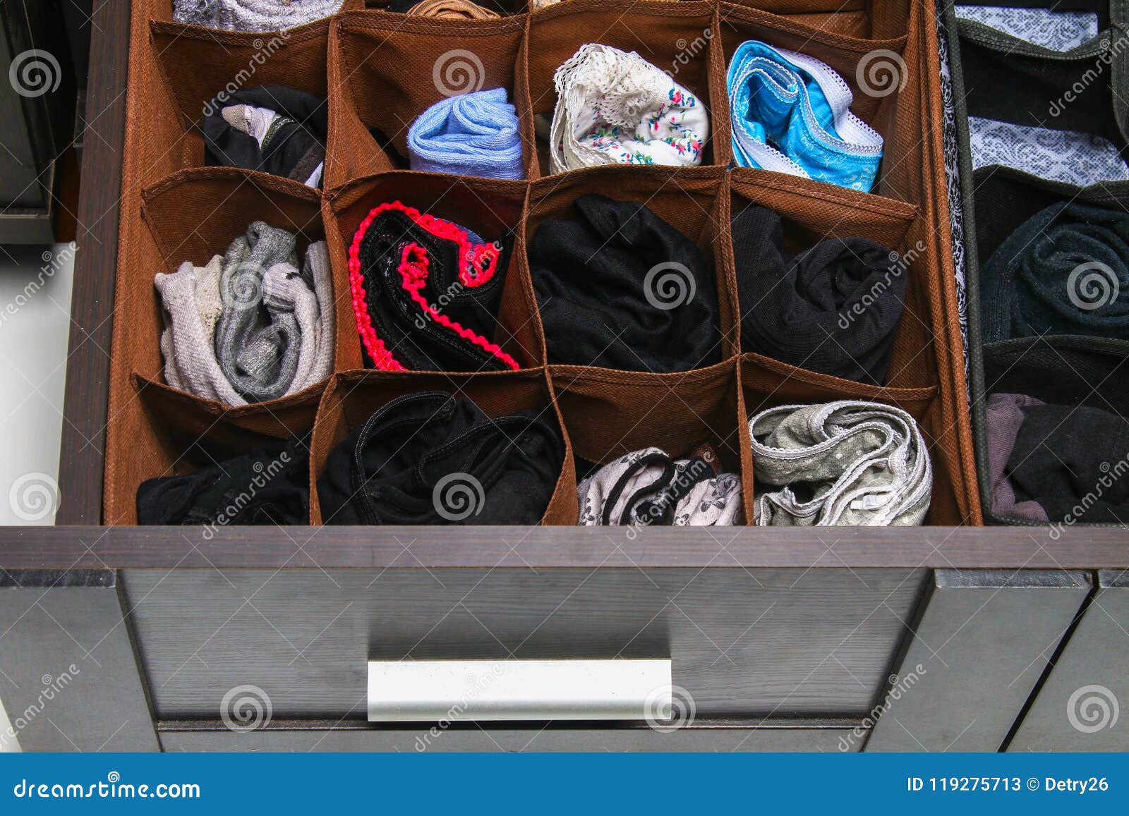 Organization of Storage of Socks and Panties in the Drawer of the Chest of  Drawers, Cabinet. Stock Image - Image of female, open: 119275713