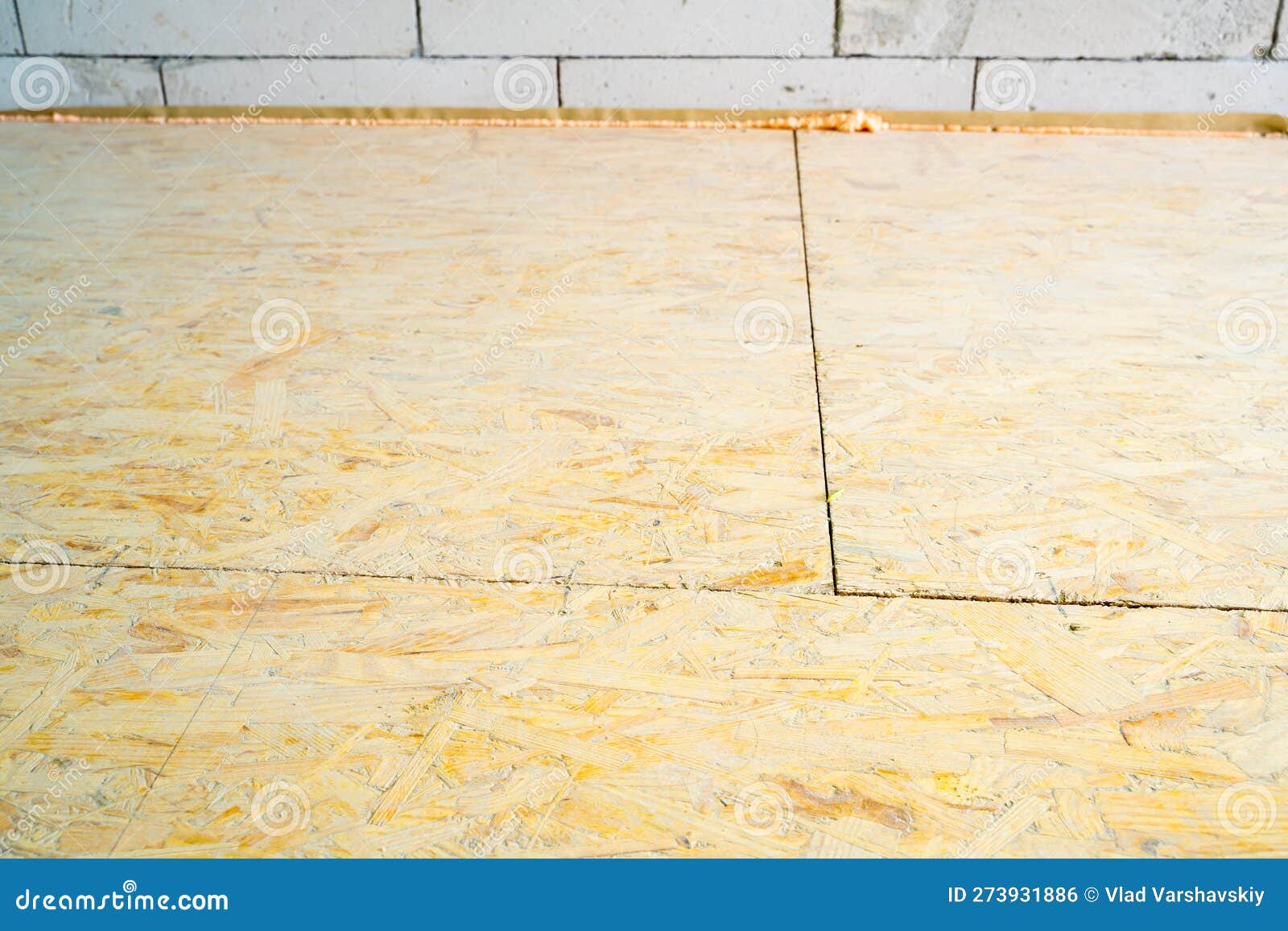 Oriented Strand Board Flooring at a Construction Site. Draft Floor for