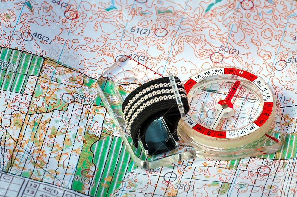 Orienteering. Compass and Topographic Map. Navigation Equipment for Orienteering. the Concept 