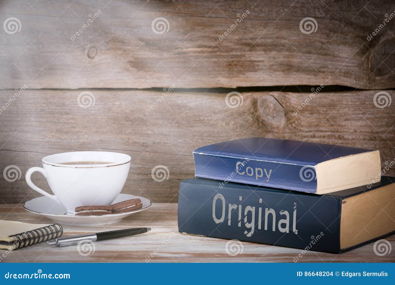 Original and Copy. Stack of Books on Wooden Desk Stock Photo Image of