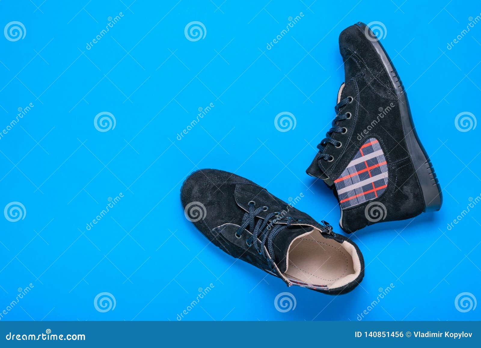Original Women`s Demi-season Sports Style Shoes on a Blue Background ...