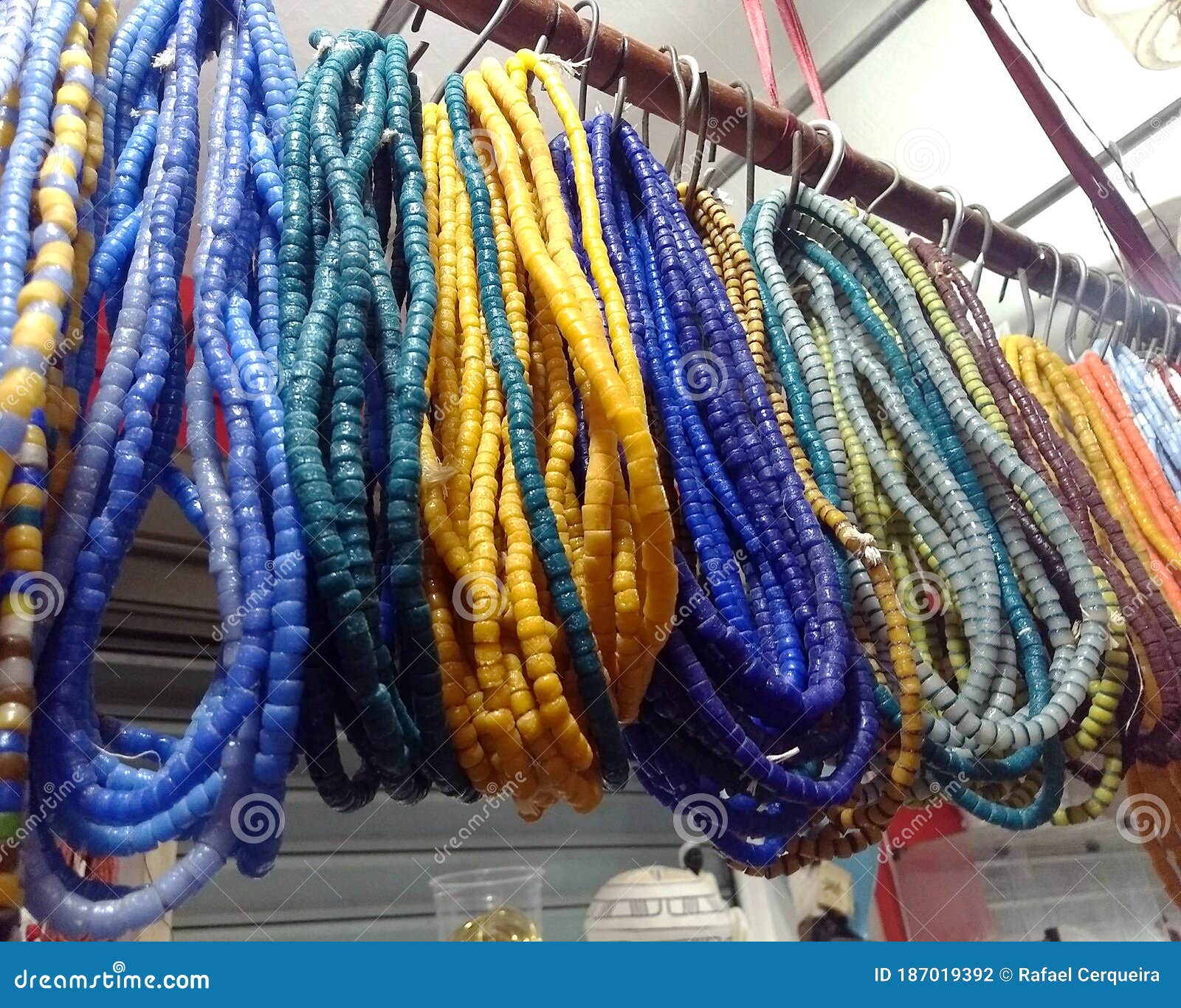 orixÃÂ¡s guide necklace on a clothesline - colored guides