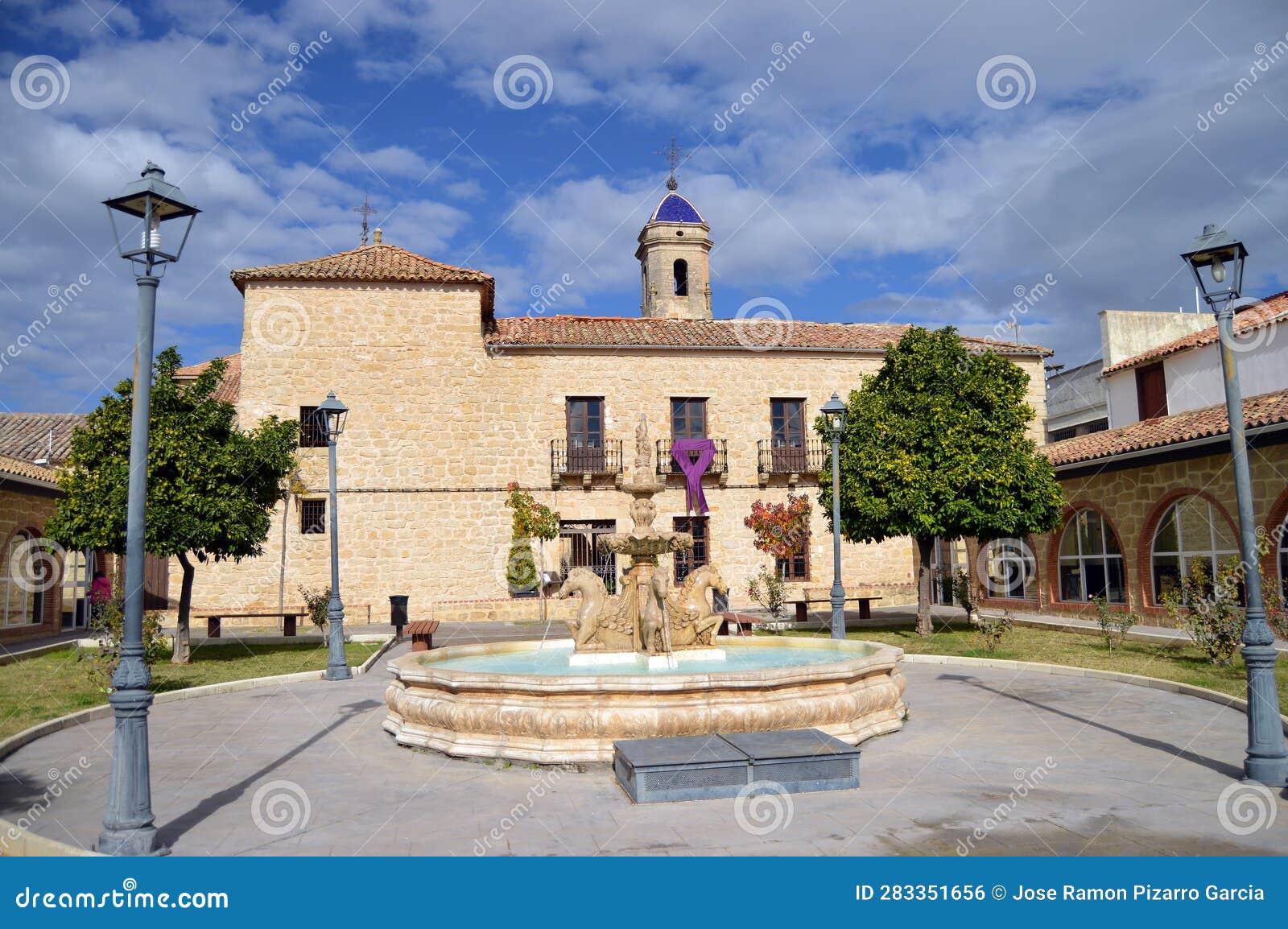 ornamental fountain in the market square in castellar, jaen province, spain