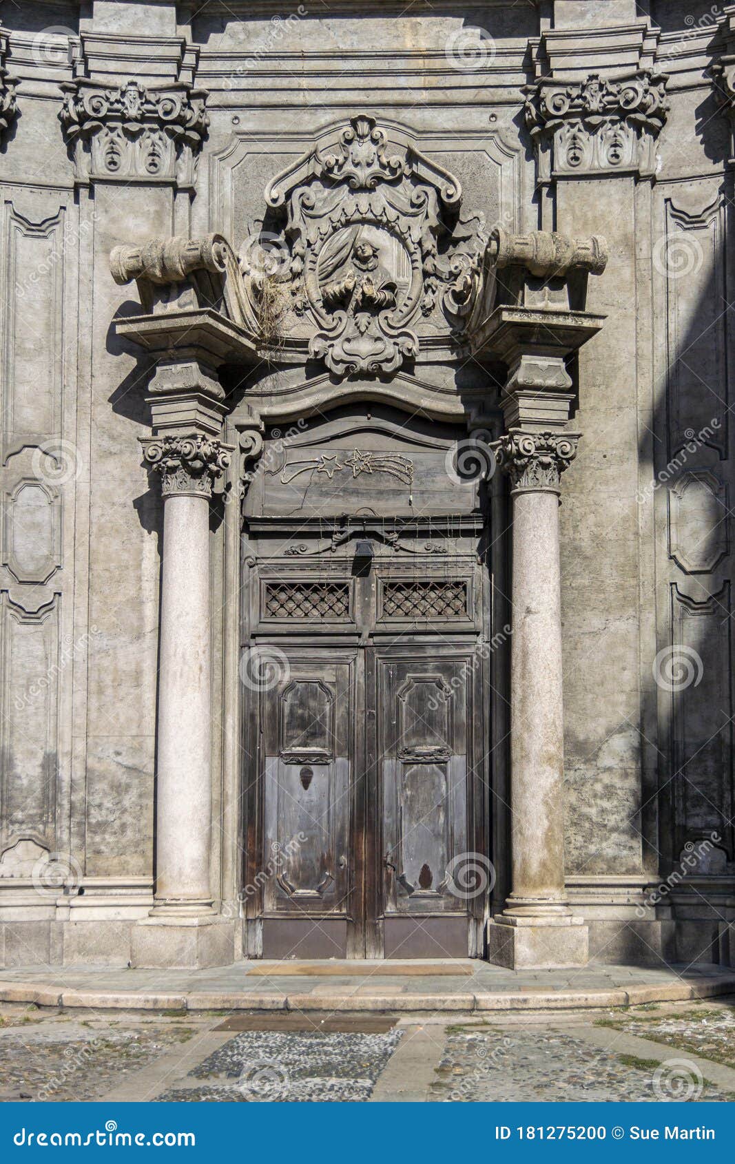 ornate church entrance, milan, italy