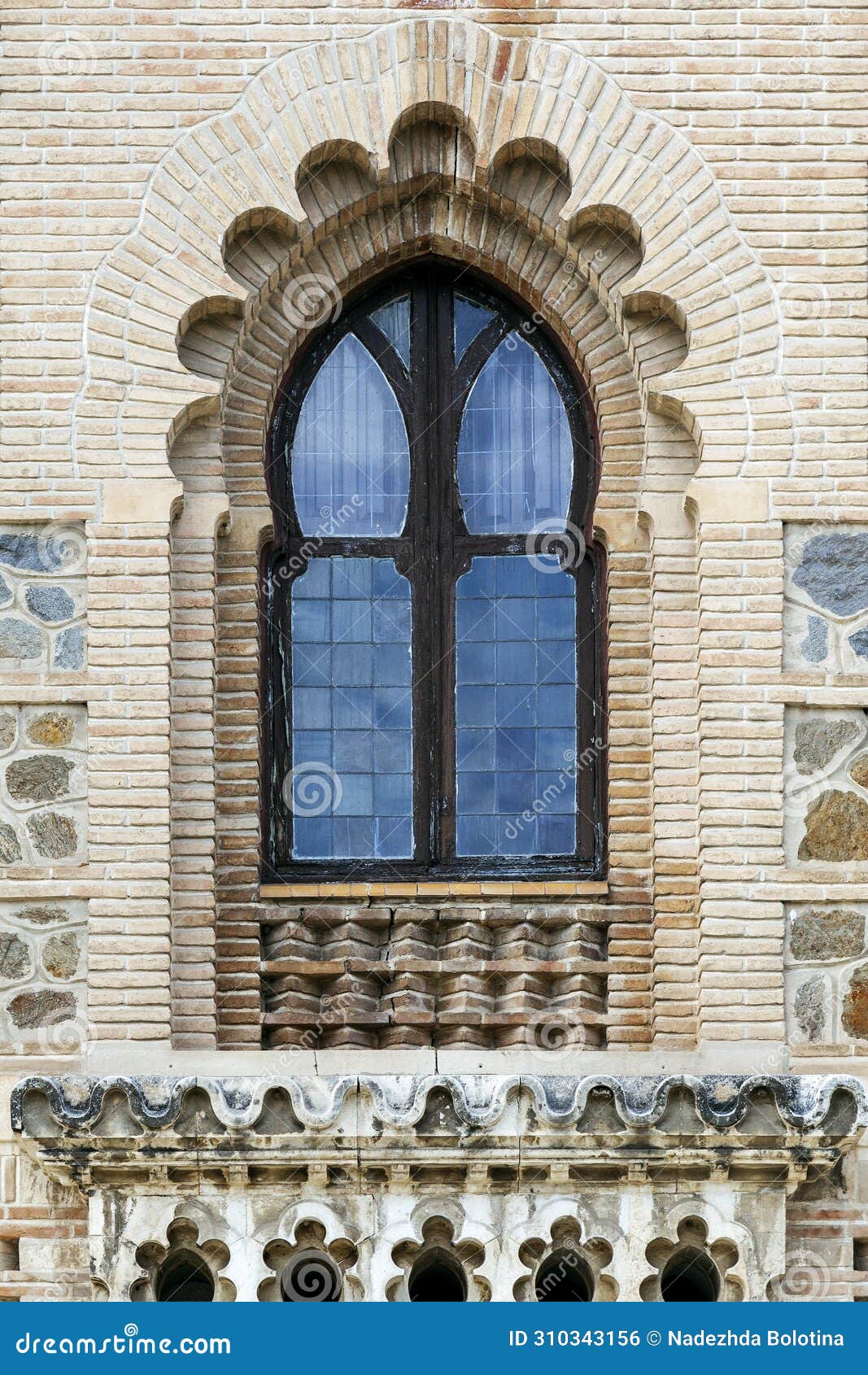 ornate window in moorish style in toledo railway station