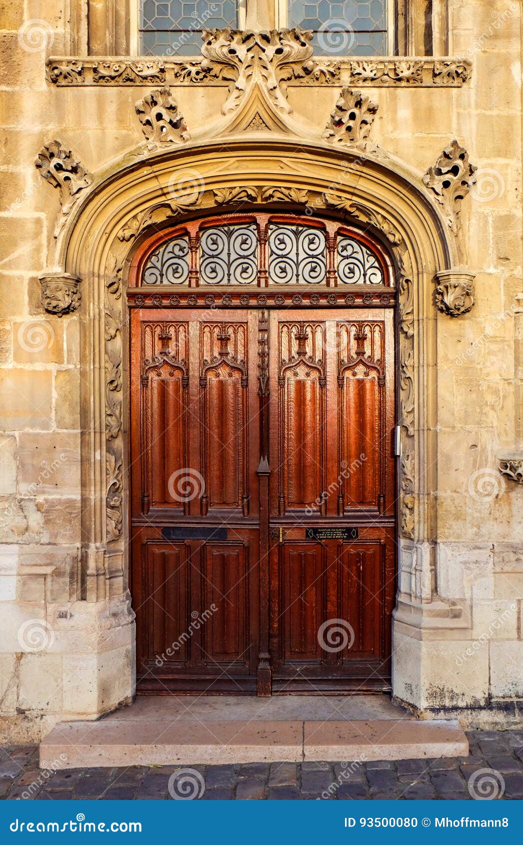 Ornate Wooden Double Door Entrance To An Old Church Stock Photo