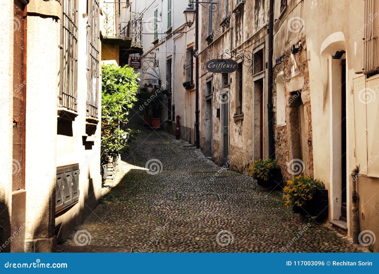 narrow street in orta san giulio, descending to the orta lake