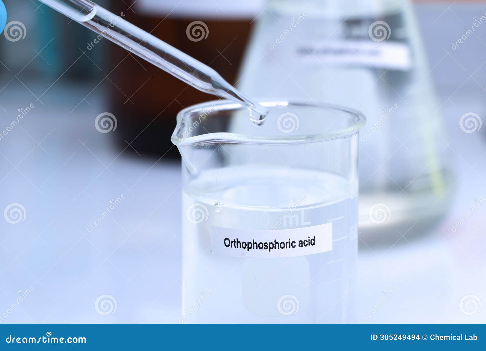 ortho phosphoric acid in bottle , chemical in the laboratory and industry