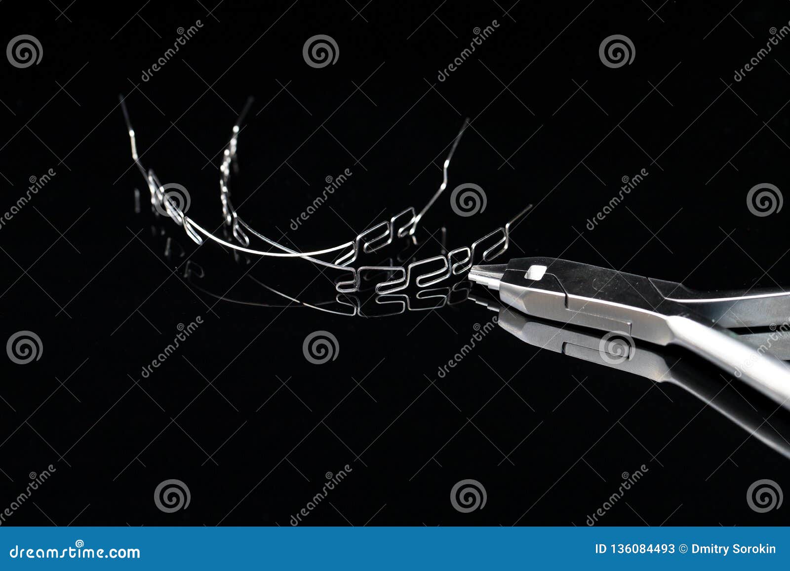 Orthodontics Tool Multiloop Braces System, on Black Background Stock ...