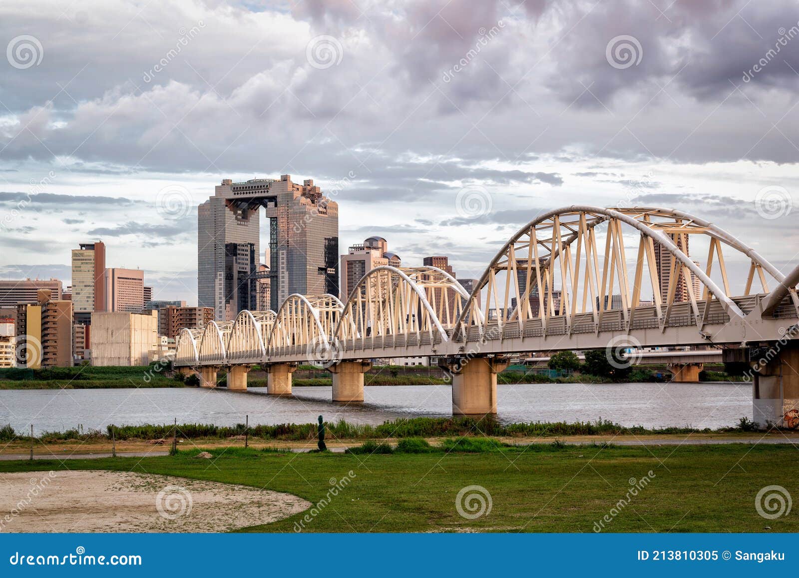 osaka skyline at sunset and yodogawa river