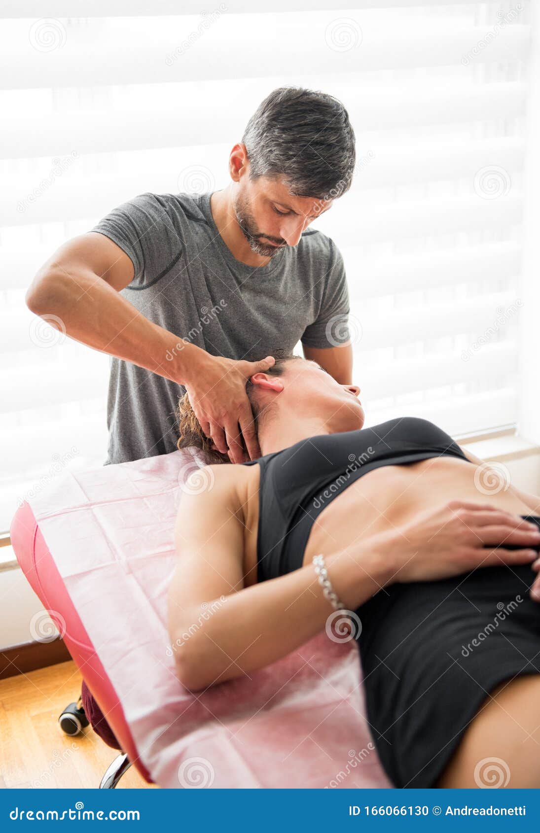 osteopath performing cervical trust therapy