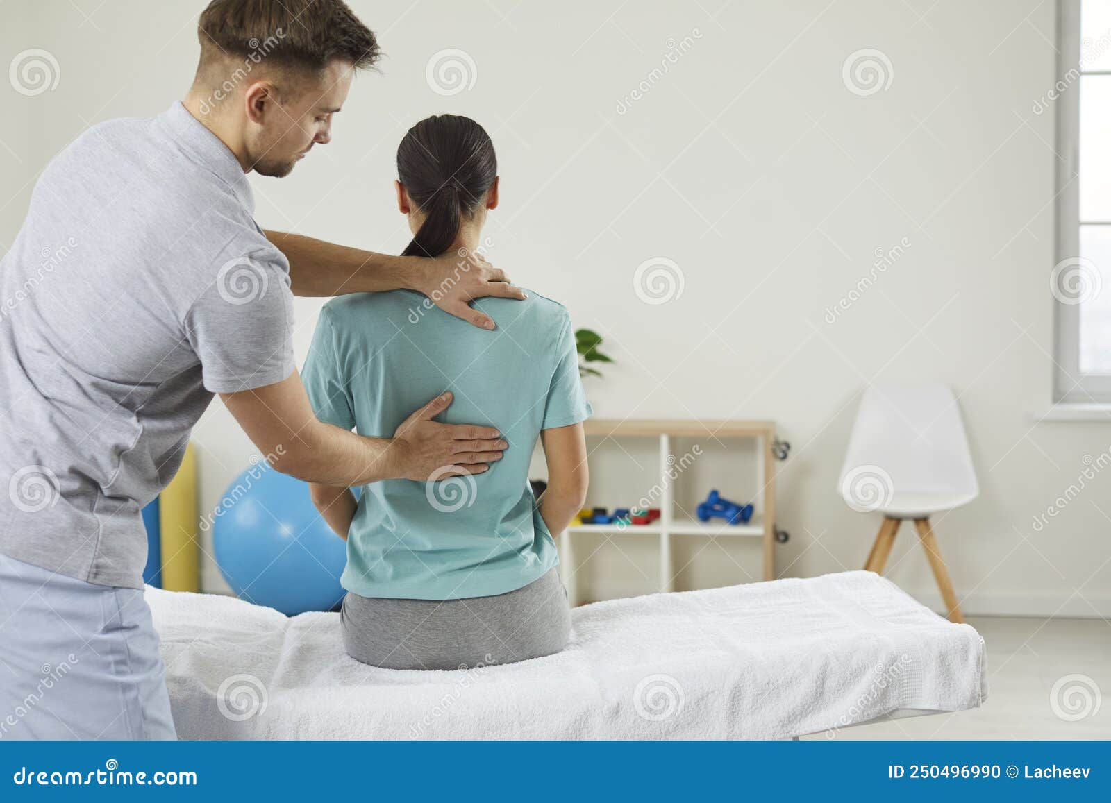 Osteopathic Medicine And Physiotherapy Osteopath Examining Womanand X27s Back In In Modern