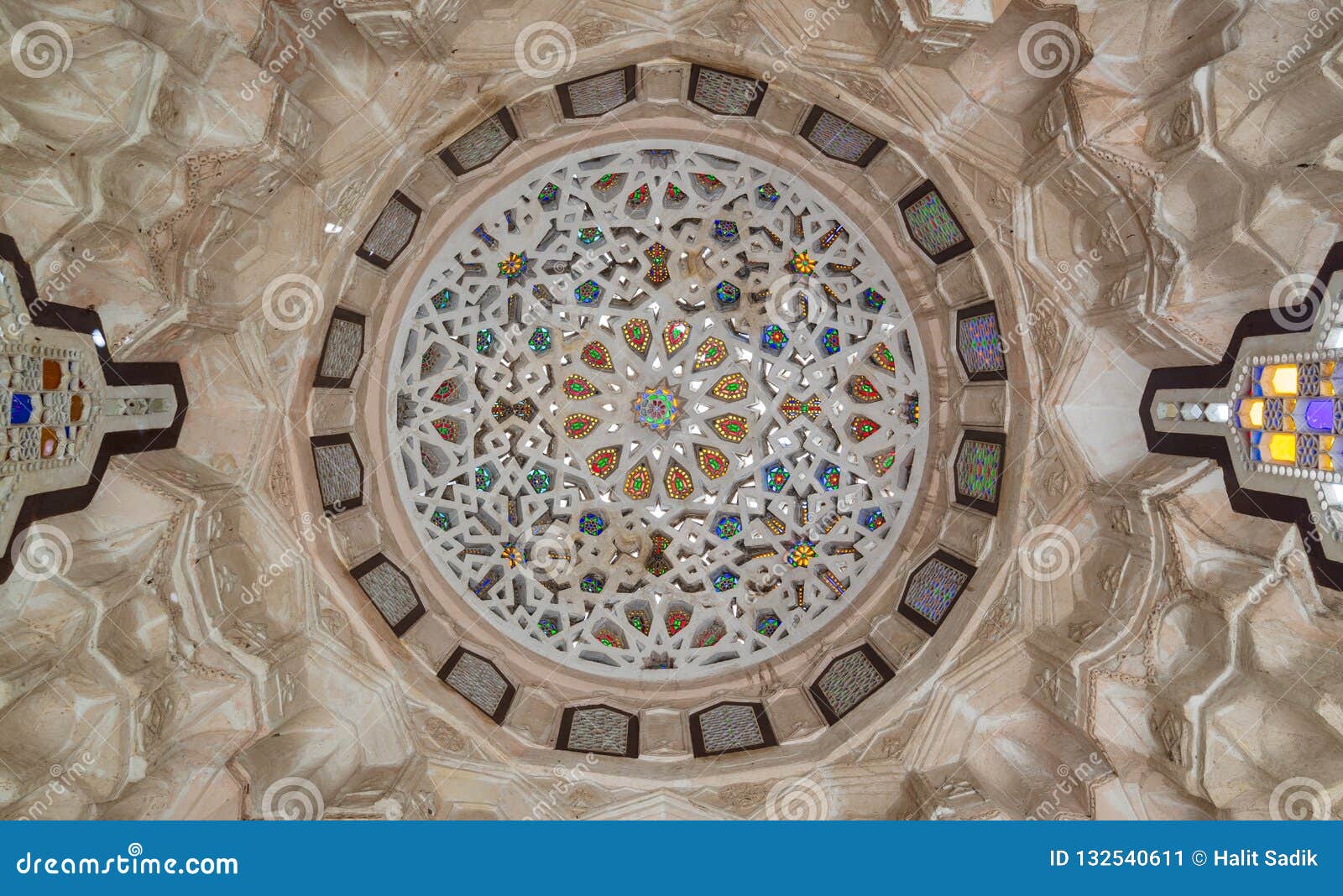 carved plaster dome decorated with colored glass pieces of a pergola in front of el sehemy historical house, cairo, egypt
