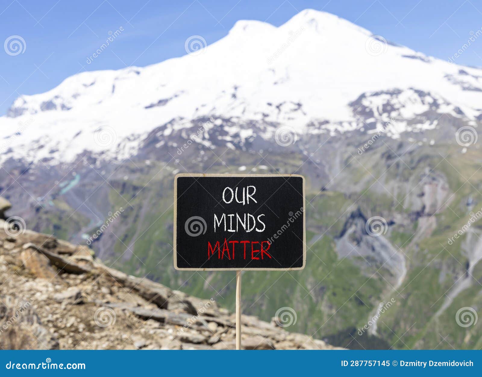 our minds matter ourmindsmatter . concept words our minds matter on beautiful black chalk blackboard. beautiful mountain
