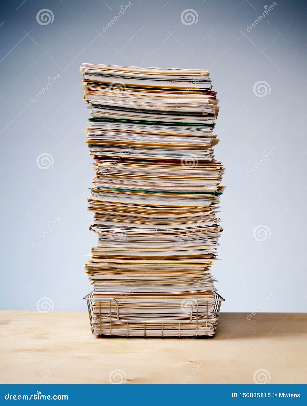 Desk Tray With Tall Stack Of Files And Paper Work Stock Image