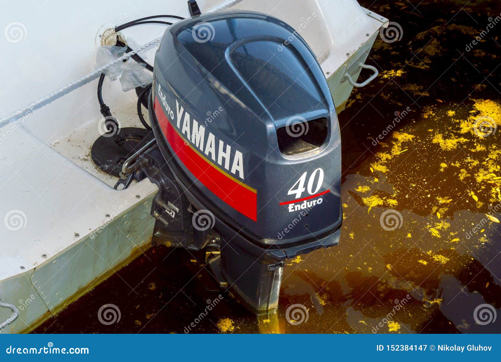 Outboard Motor Yamaha Enduro 40 On A White Boat Released Into The outboard-motor-yamaha-enduro-40-on-a-white-boat-released-into-the