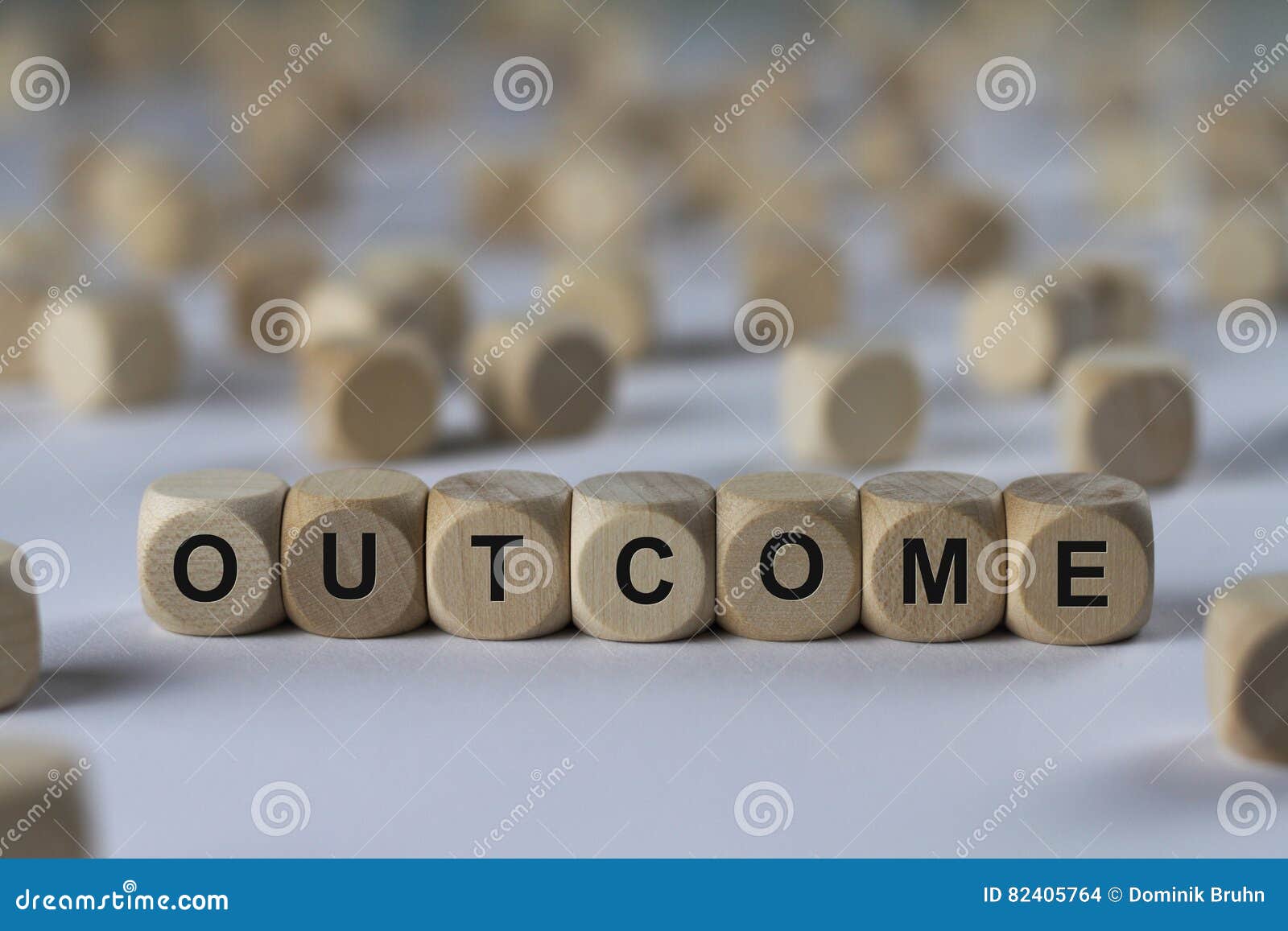 outcome - cube with letters, sign with wooden cubes