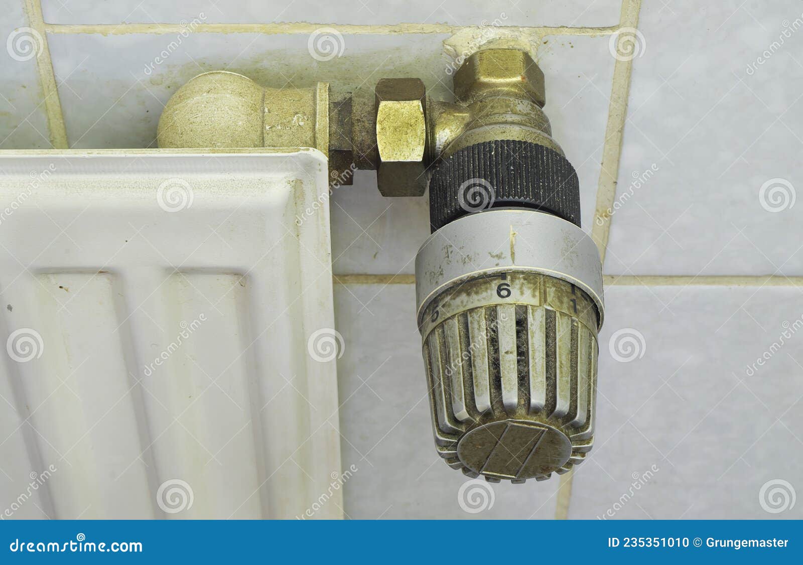 outdated  old and dirty radiator valve, renewal of the heating  and co2 savings concept,copy space
