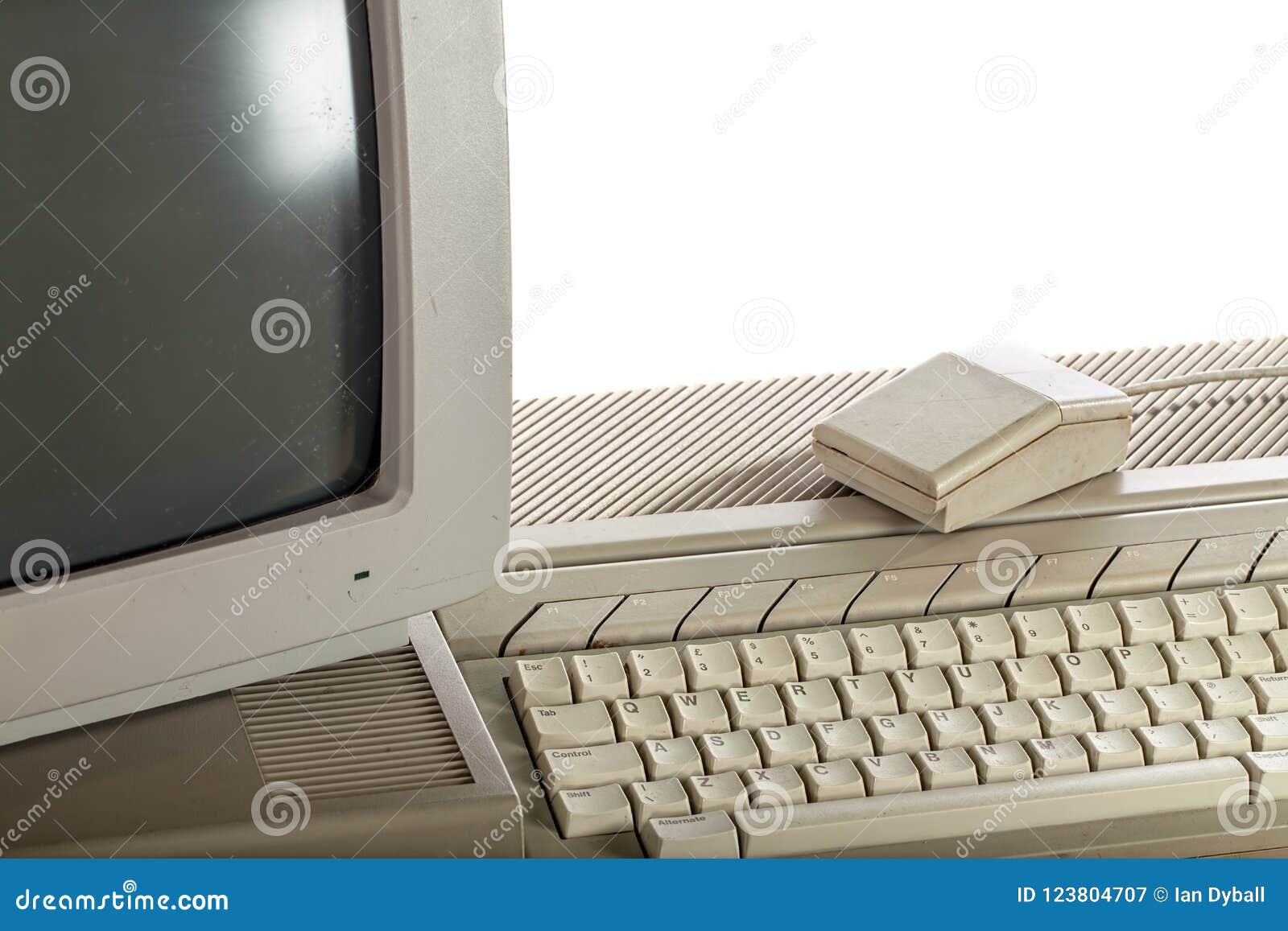 outdated technology. dirty vintage computer system with keyboard