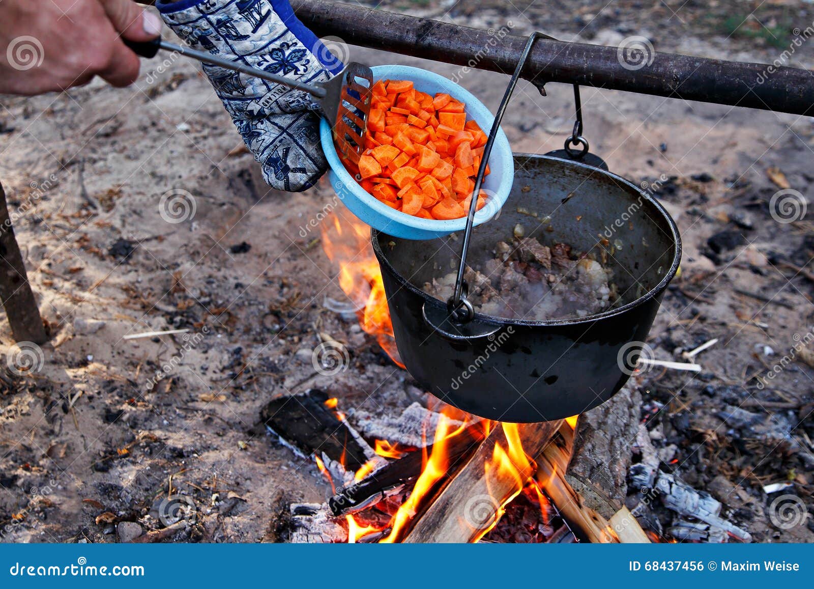 Outdoor Cooking. Making Food on a Fire in a Pot Stock Photo Image of