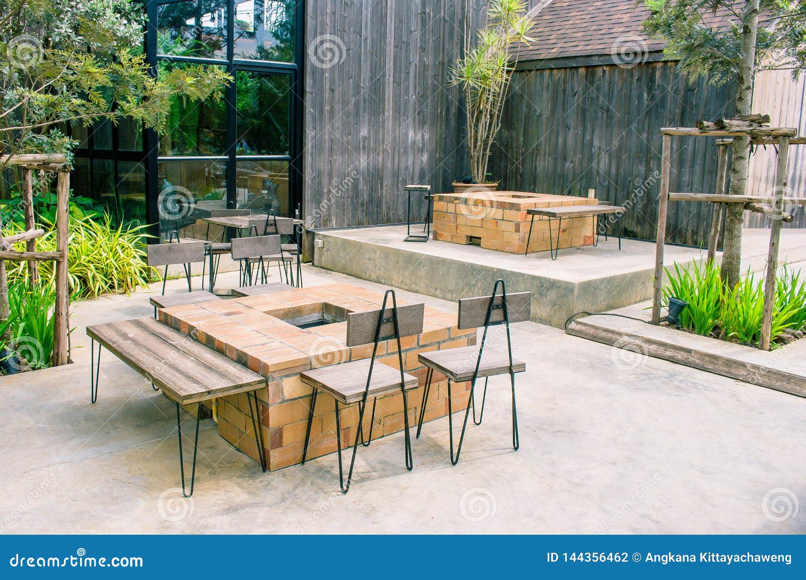 Table And Chair Place On Terrace Outside Of Restaurant Or Coffee Cafe