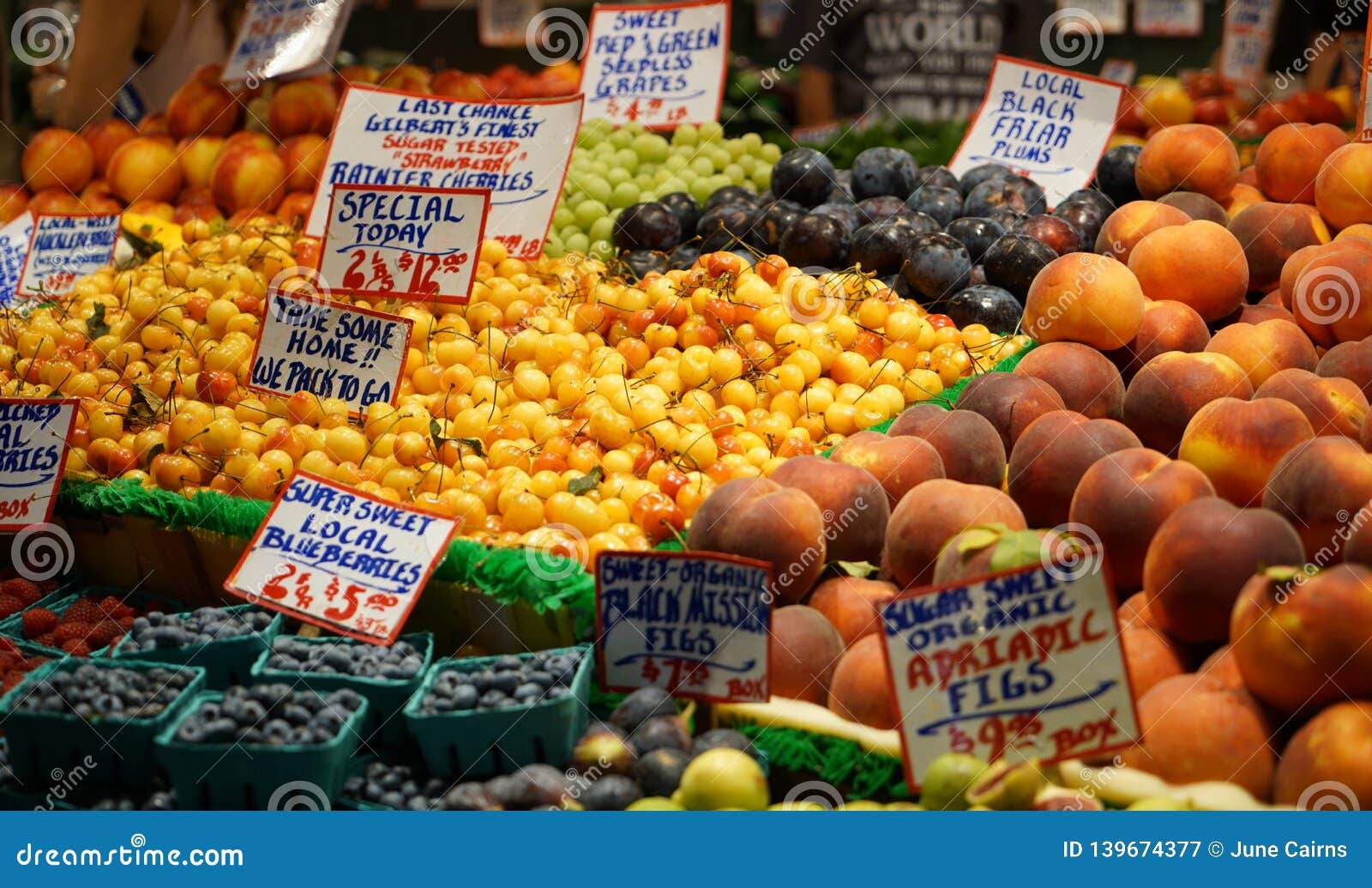 Outdoor fruit market stock image. Image of cherries 139674377