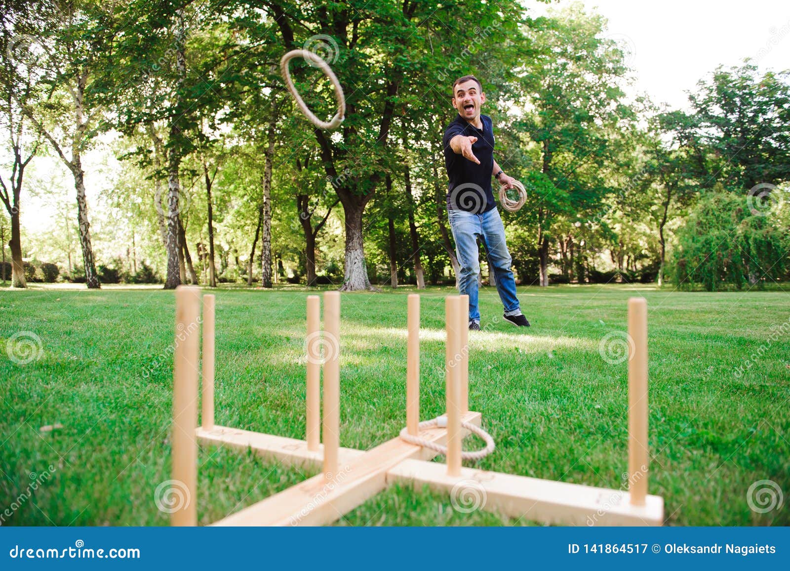 Outdoor Games Guy Playing Ring Toss in a Park Stock Image Image of