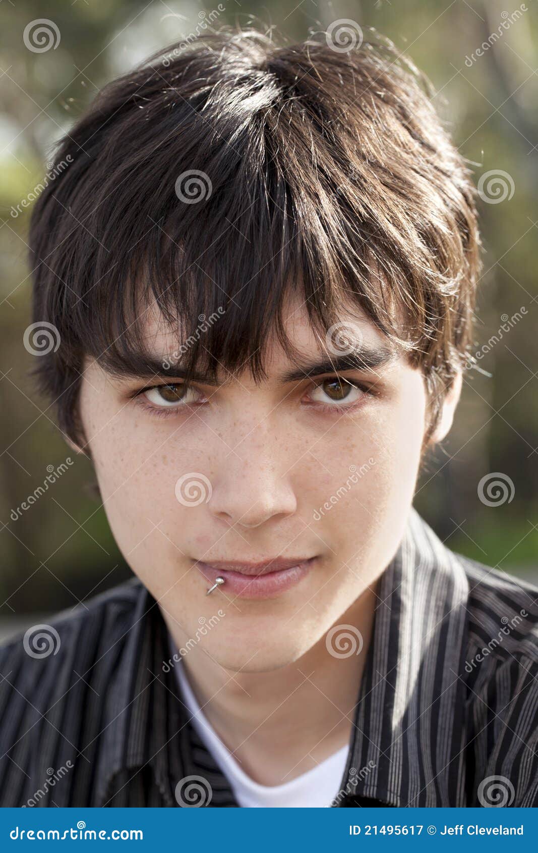 teenage boy with dark brown hair