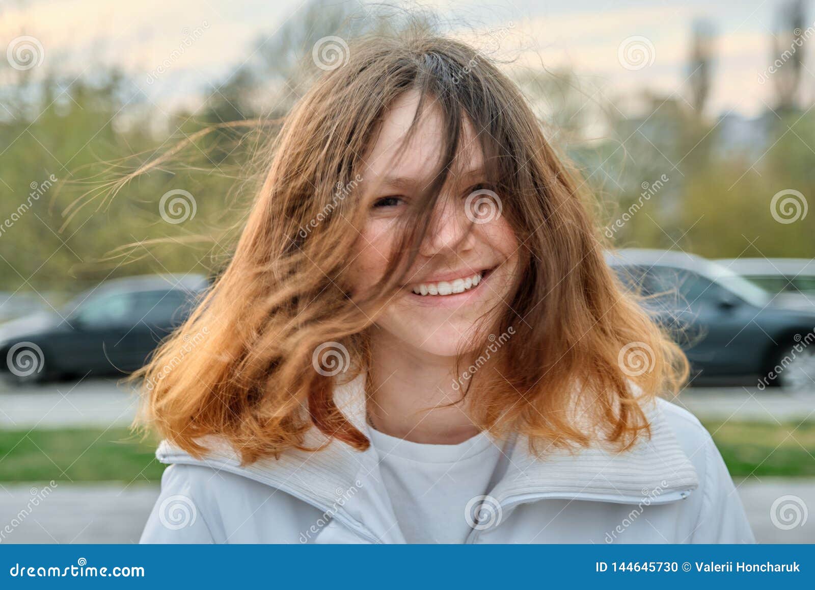 Outdoor Portrait Of Teenager Girl 15 Years Old Girl Smili