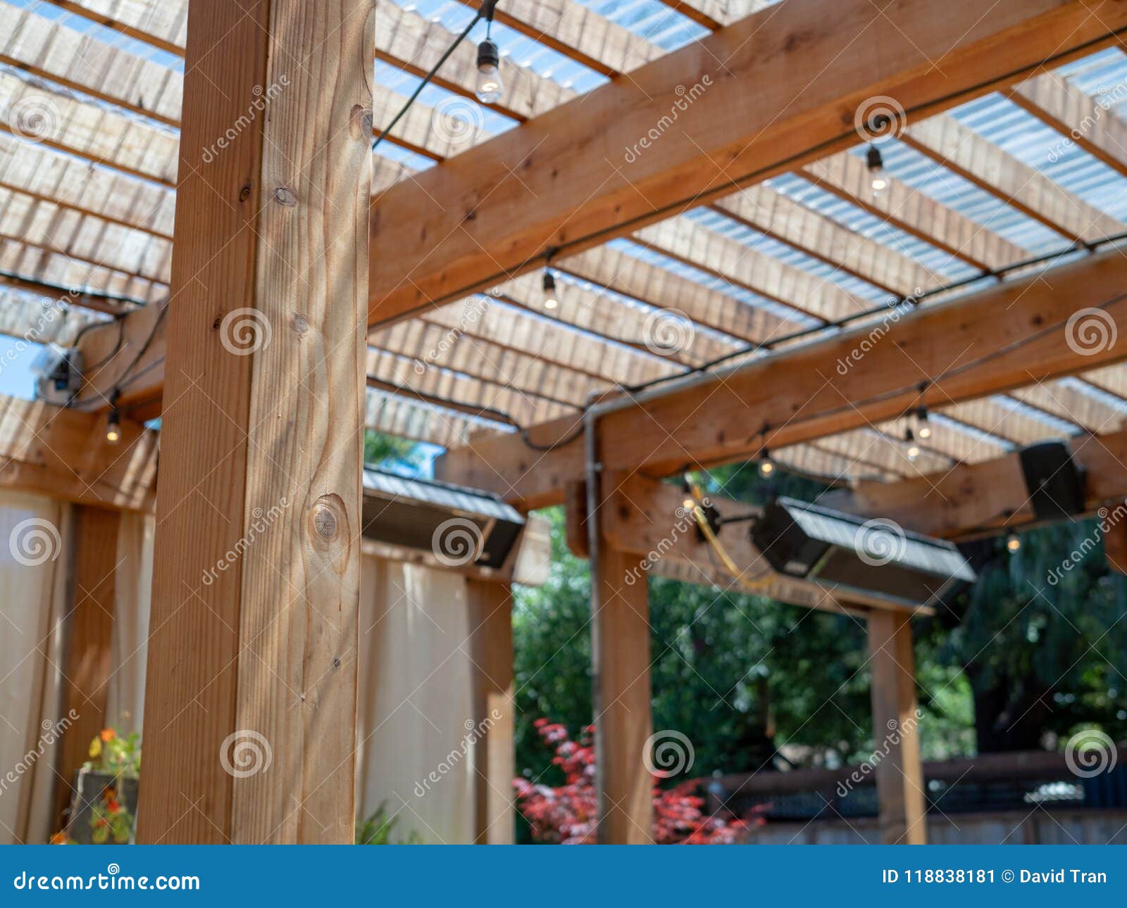 Outdoor Restaurant Set Up With Patio And Wooden Overhang And Spe