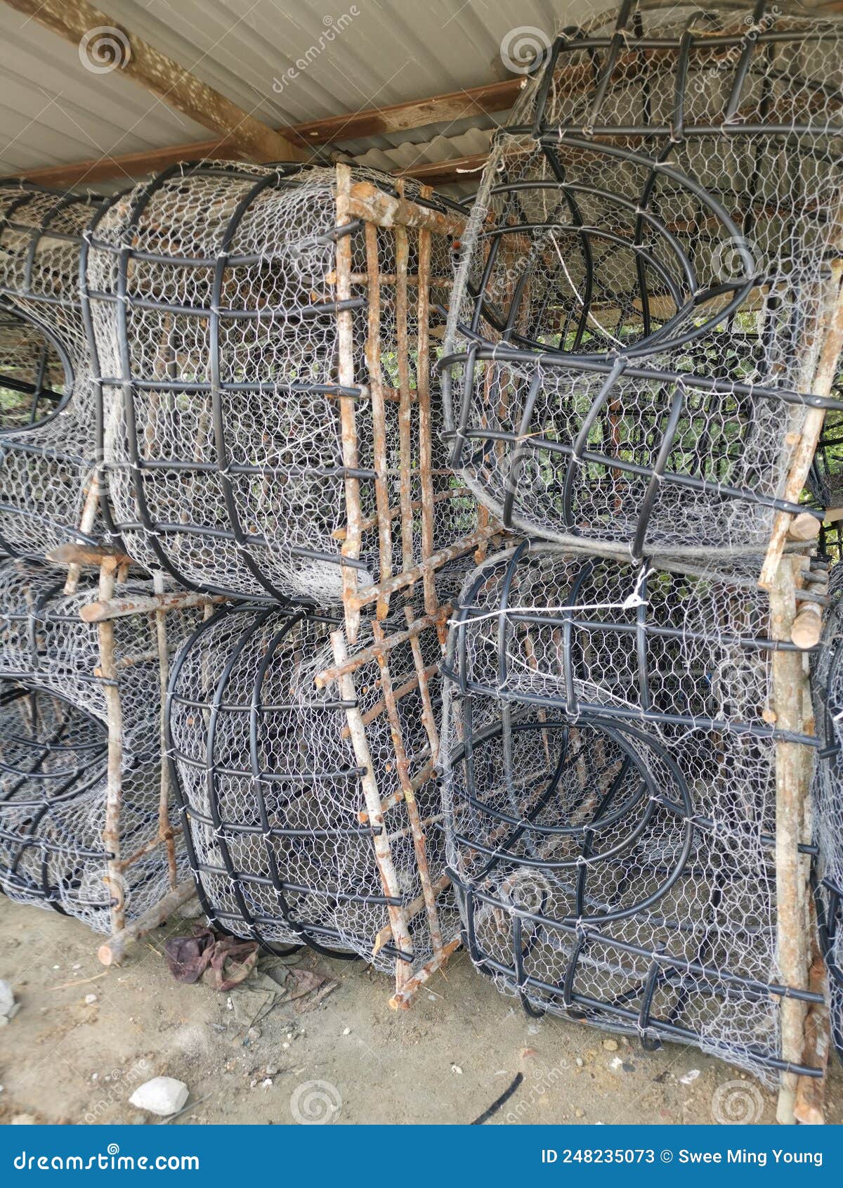 Outdoor Scene of the DIY Fish Trap Structure Make from Mangrove Wood,wire  and Polystyrene Pipe. Stock Image - Image of metallic, industry: 248235073
