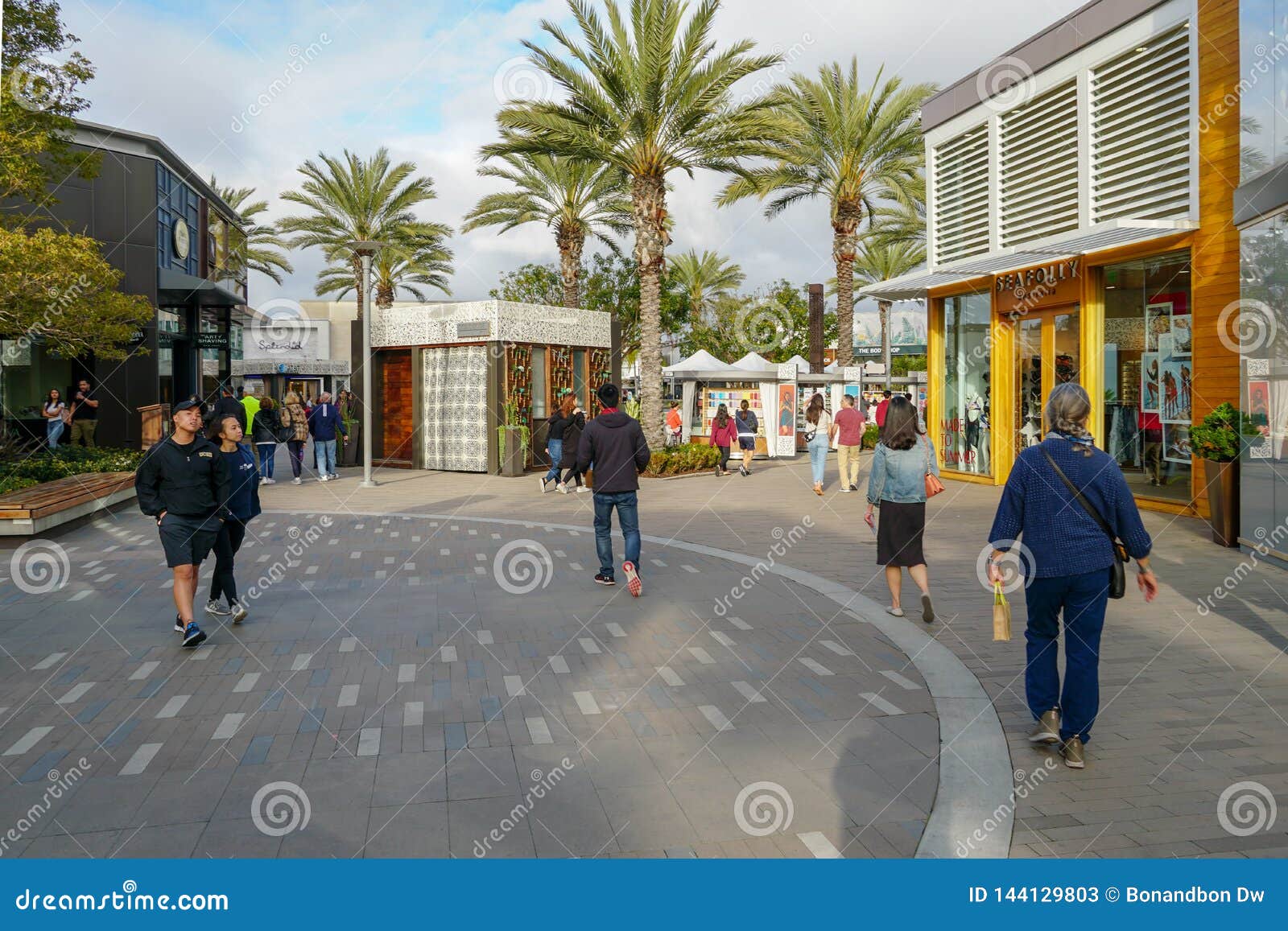 Outdoor Shopping Center with Upmarket Chain Retailers, a Movie