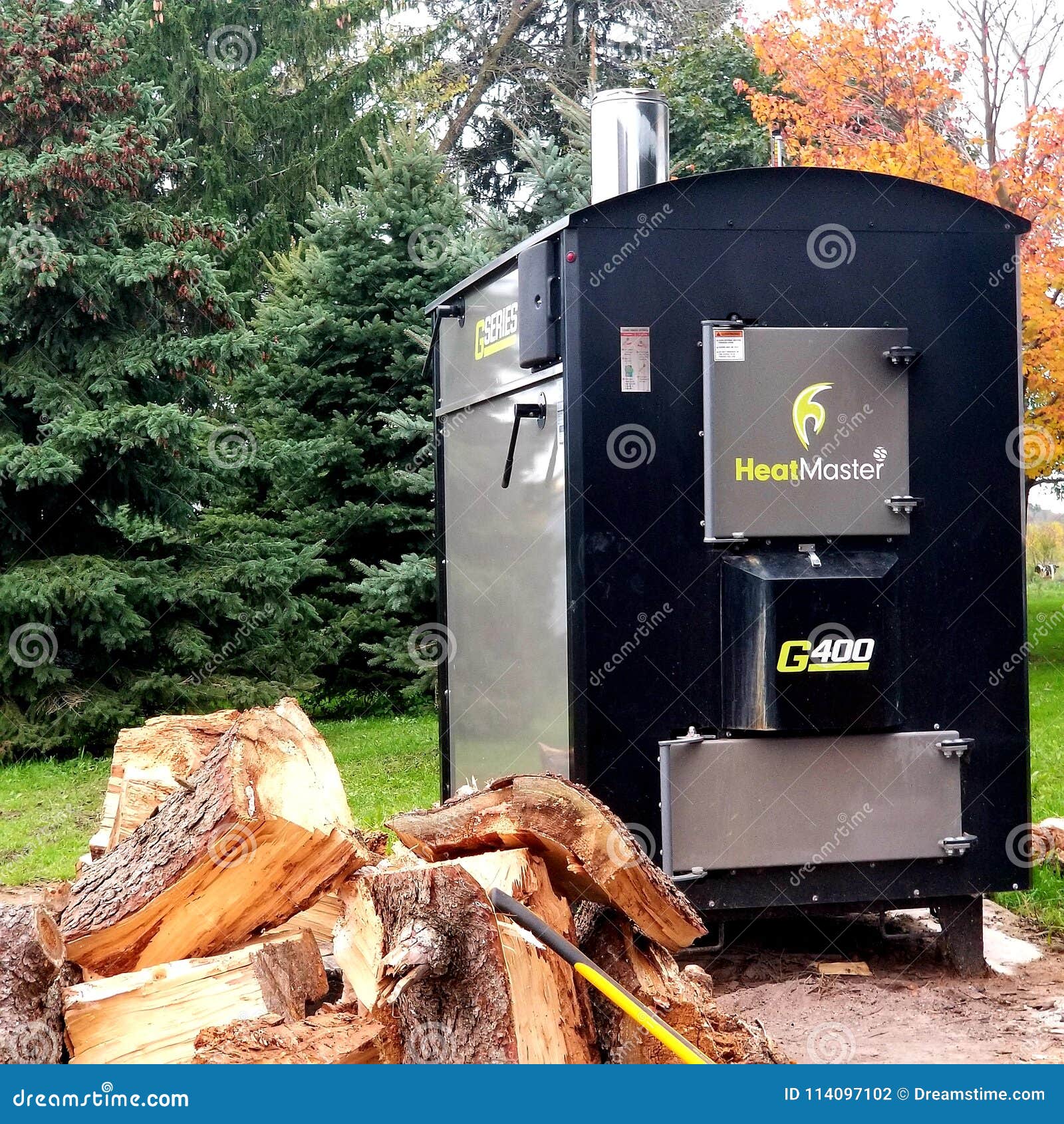Outdoor wood boiler. editorial photography. Image of firewood - 114097102
