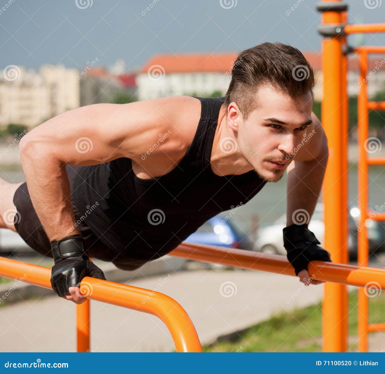 Outdoor workout on bars. stock photo. Image of black 71100520