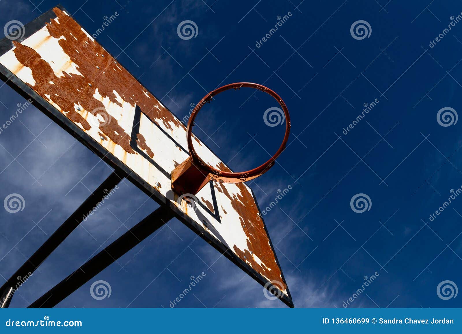 outdoors basketball with a blue sky