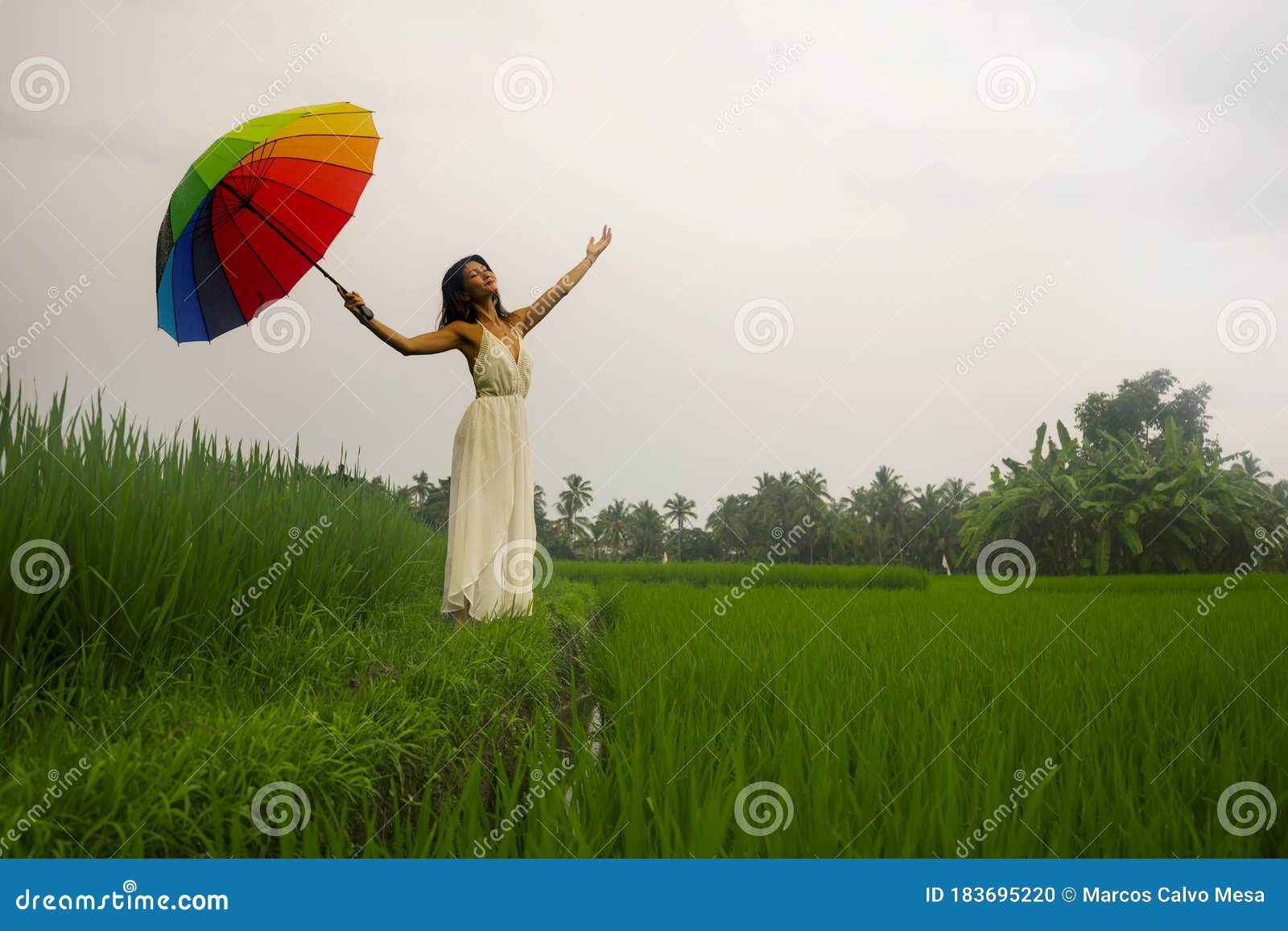 Girl holding umbrella rainbow japanese