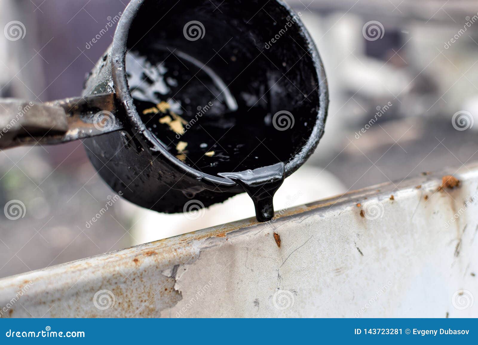Outflow of Melted Hot Black Tar from Metal Cup on Surface with Steam Stock Image Image of