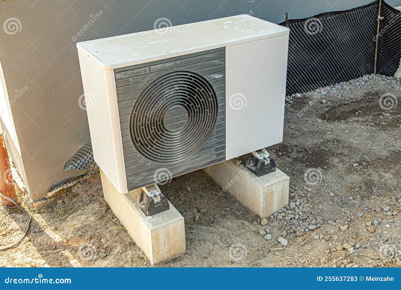 Outside Module of an Heat Pump Heating Unit at a Construction Site