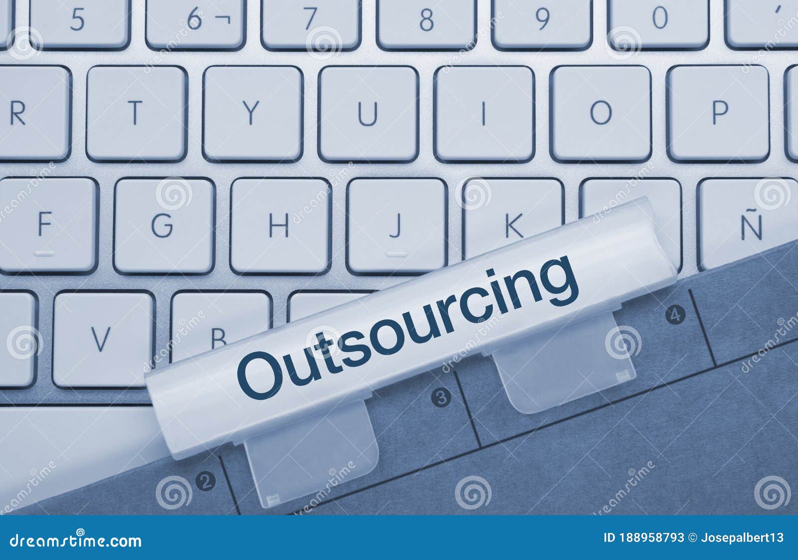 outsourcing - inscription on blue keyboard key