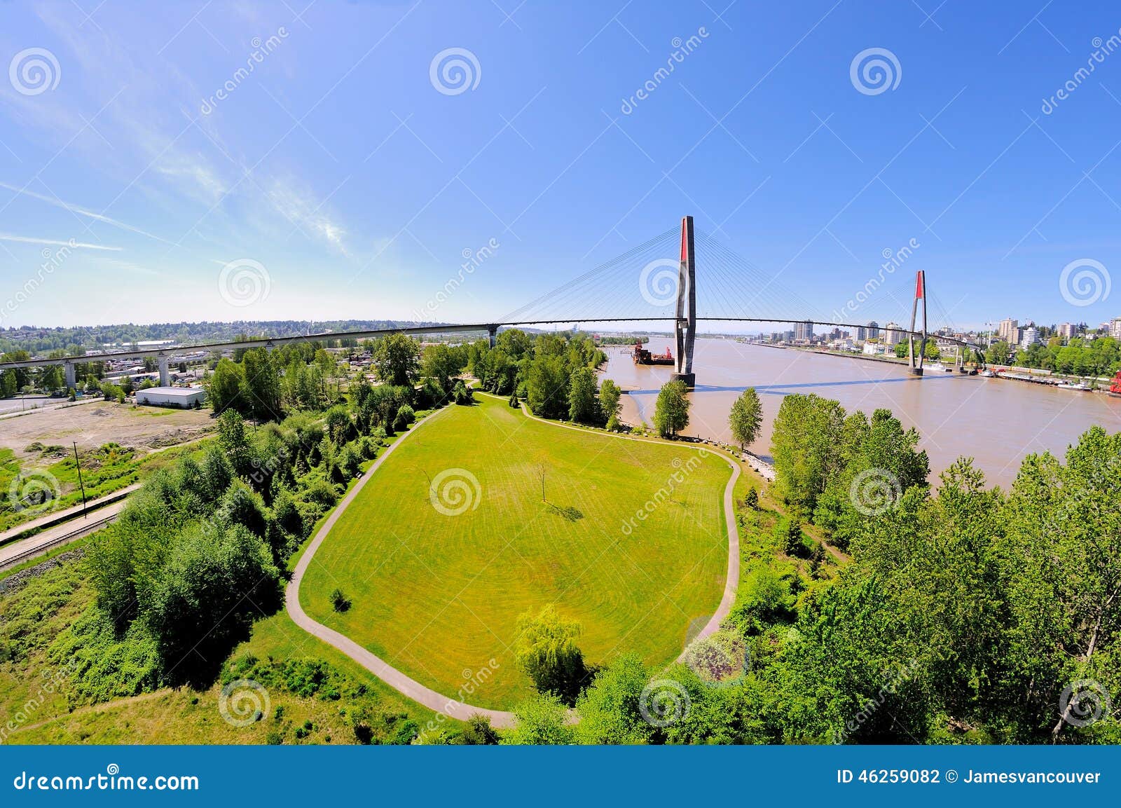 An Oval Lawn in a Park by a Bridge Stock Photo Image of springtime
