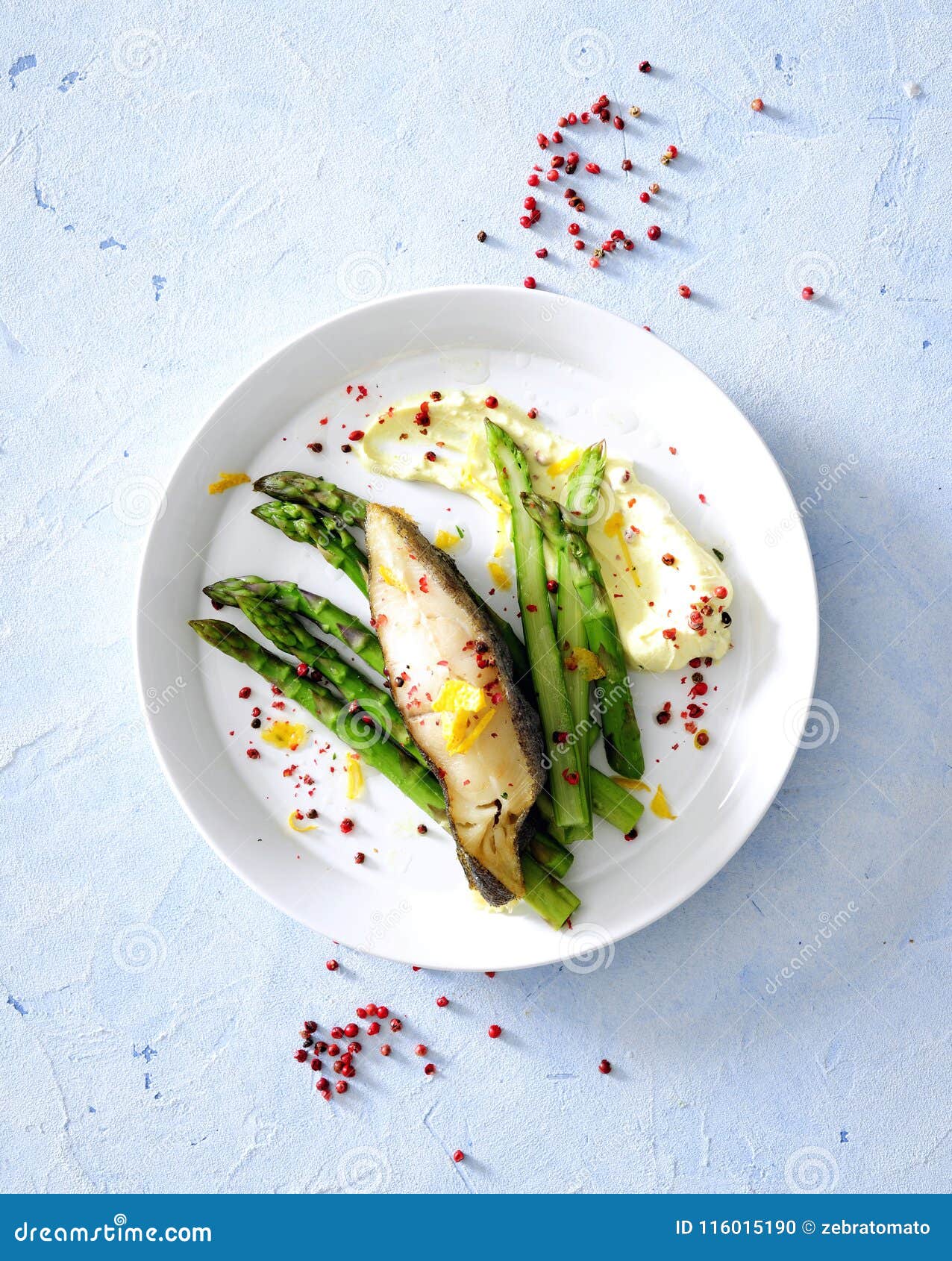 Oven Baked Sea Fish Fillet with Asparagus and Herb Butter Served with ...