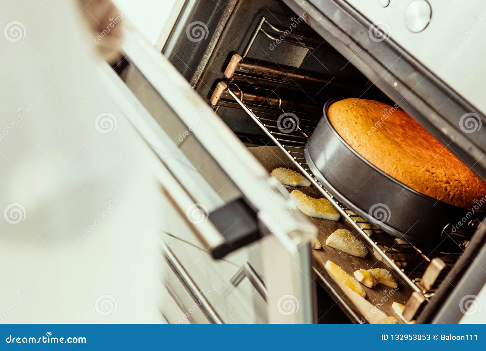 Housewife prepare cake in kitchen. Homemade cake baking in oven 13052595  Stock Photo at Vecteezy
