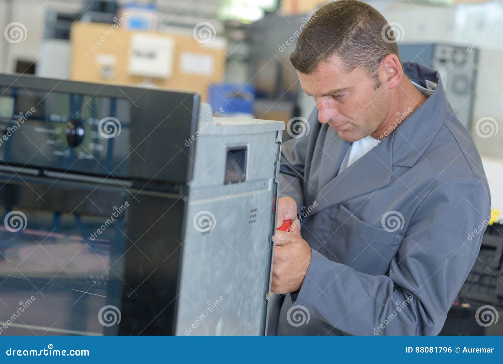 Oven technician doing work stock photo. Image of adjustment 88081796