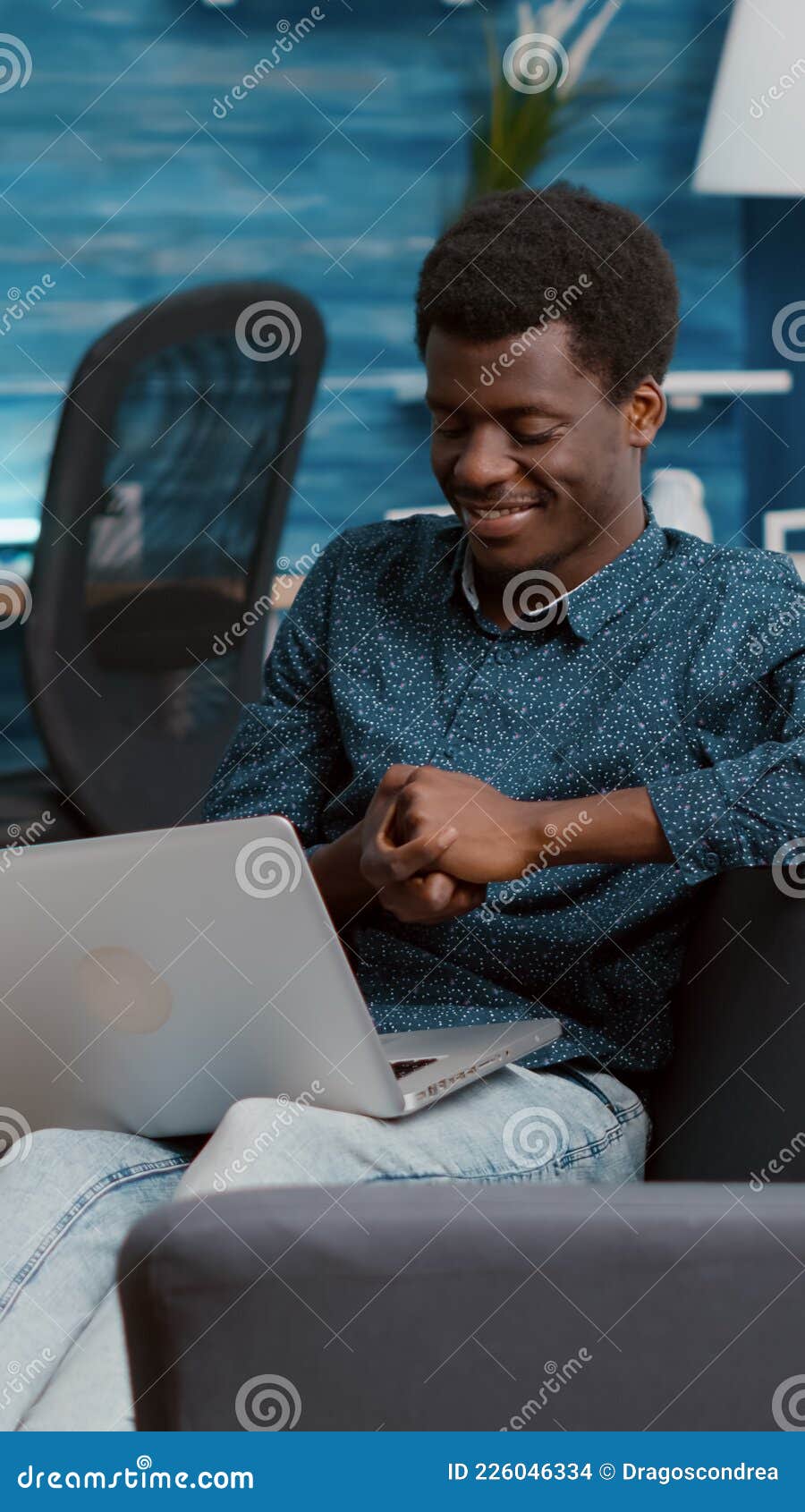 overburdened overworking exhausted african american man suffering from sleep deprivation, falling asleep with laptop in