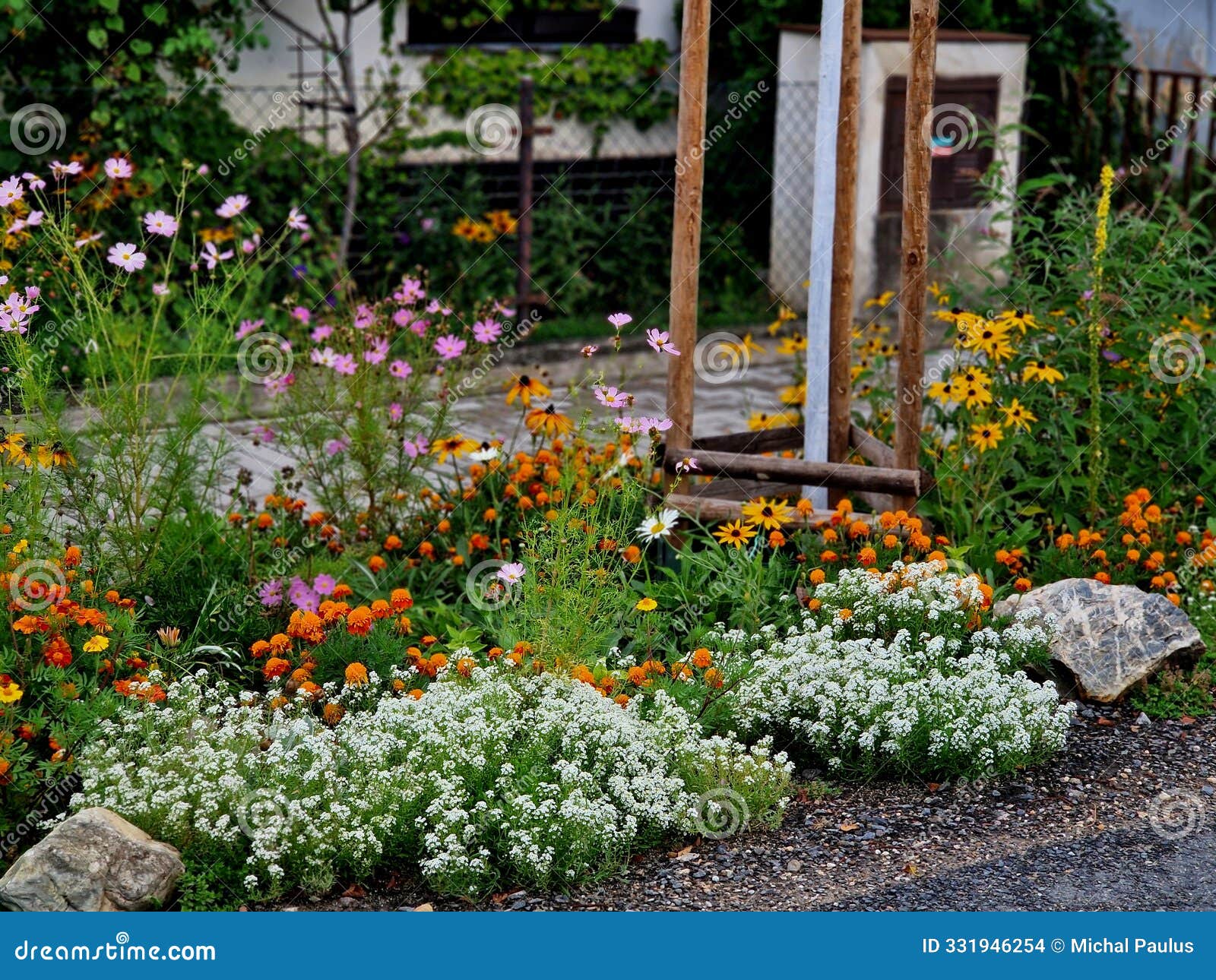 overgrown serves as a replacement for flower beds in the lawn