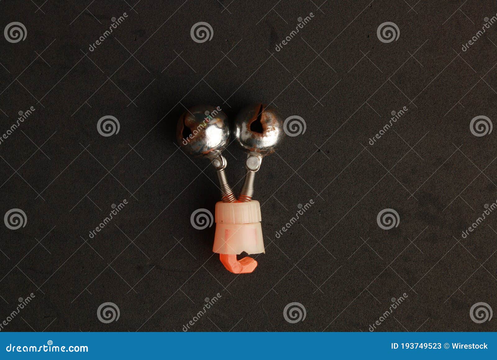 Overhead Closeup Shot of a Fishing Rattle for Fishing Rods on a Black  Background Stock Image - Image of anchor, hobby: 193749523